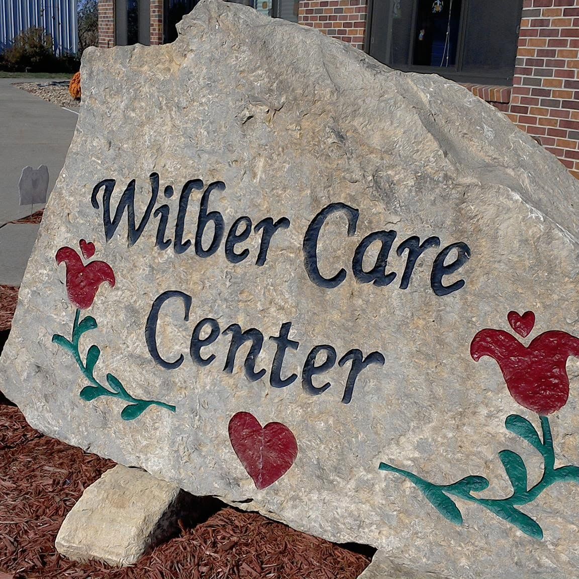 WILBER CARE CENTER logo