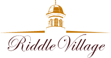 Riddle Village logo
