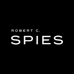 Robert C Torres logo